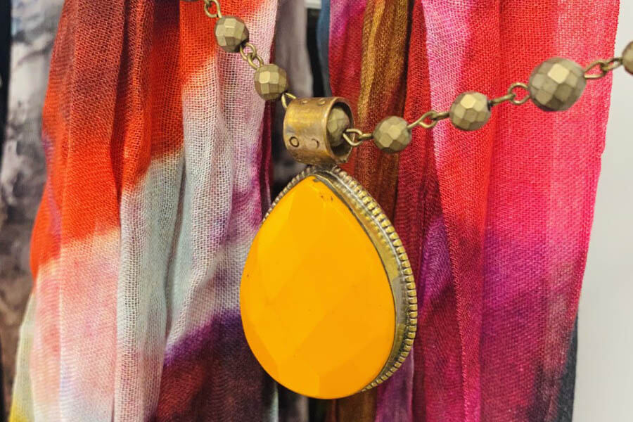 yellow and brass colored handmade necklace